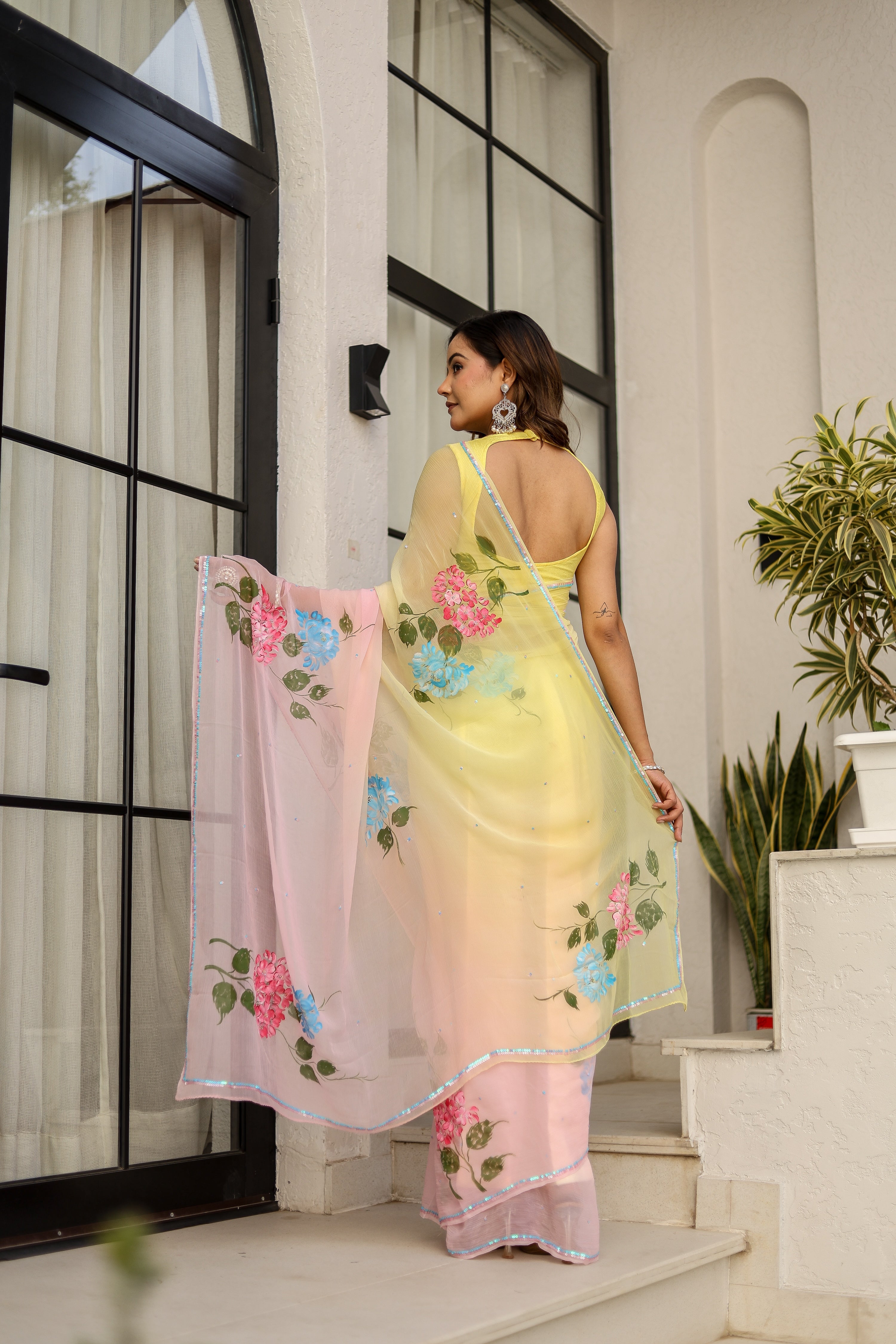 Blush & Bloom (Handpainted pure viscose chiffon saree with sequins work)