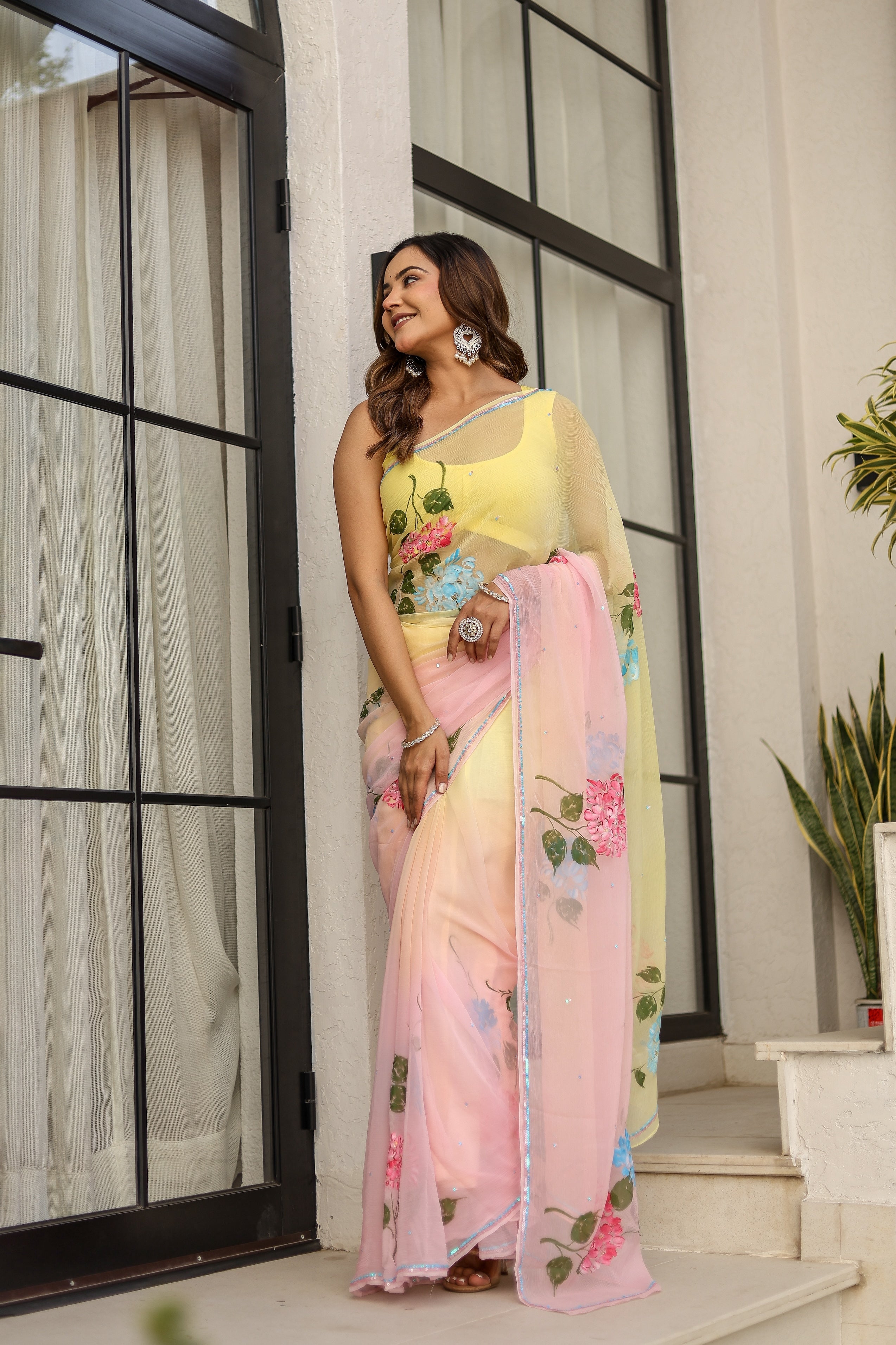 Blush & Bloom (Handpainted pure viscose chiffon saree with sequins work)