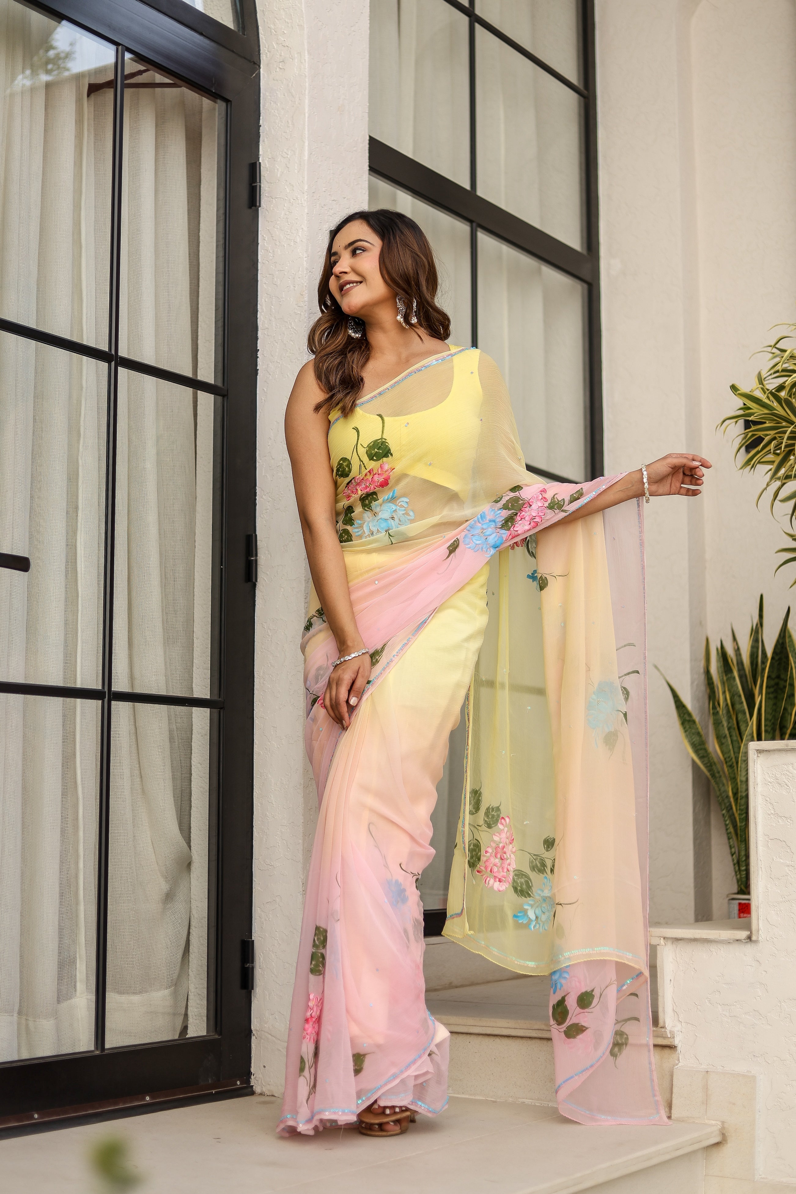Blush & Bloom (Handpainted pure viscose chiffon saree with sequins work)