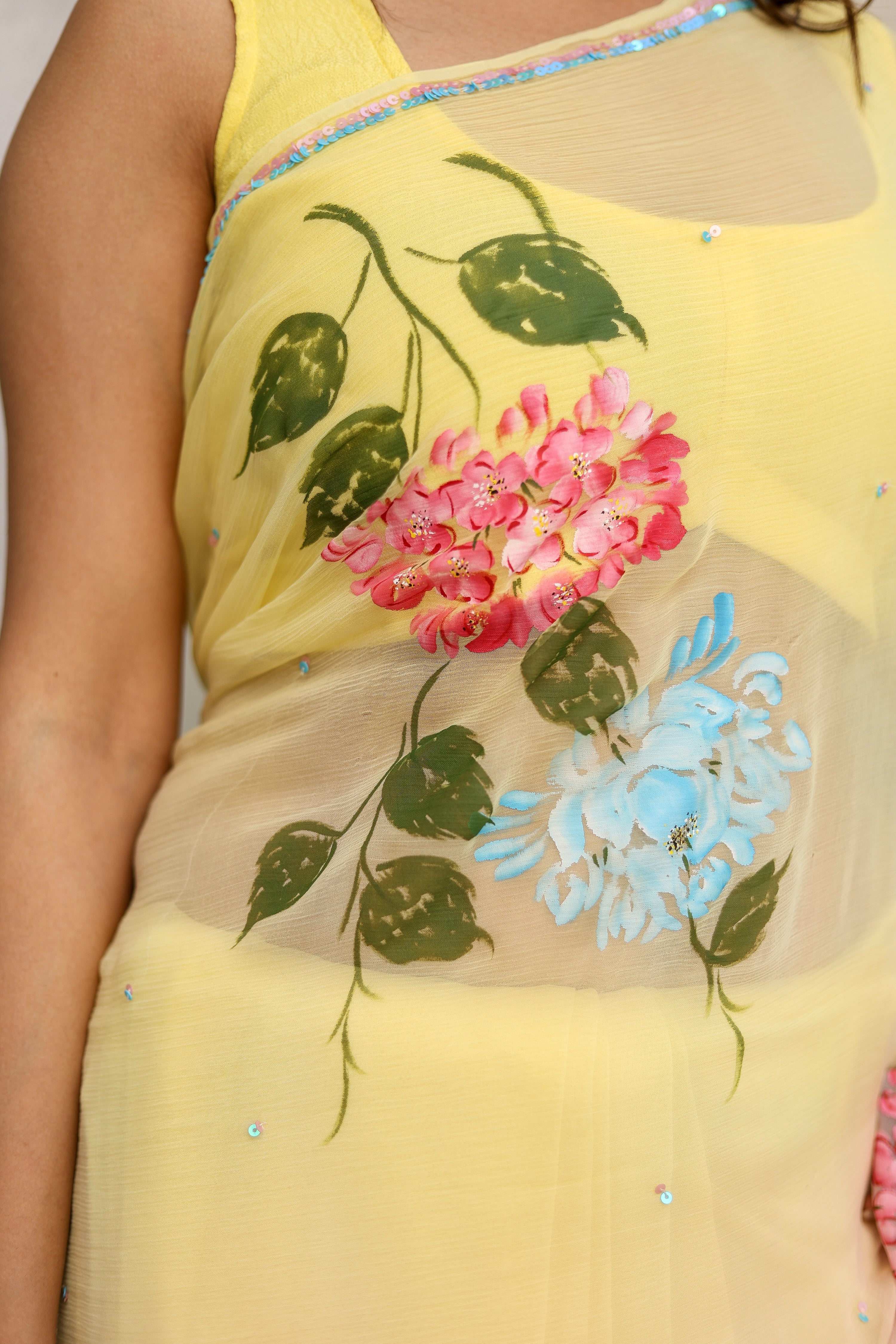 Blush & Bloom (Handpainted pure viscose chiffon saree with sequins work)
