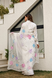 Moonlit Florals (Handpainted pure viscose chiffon saree with sequins work and pearl border)
