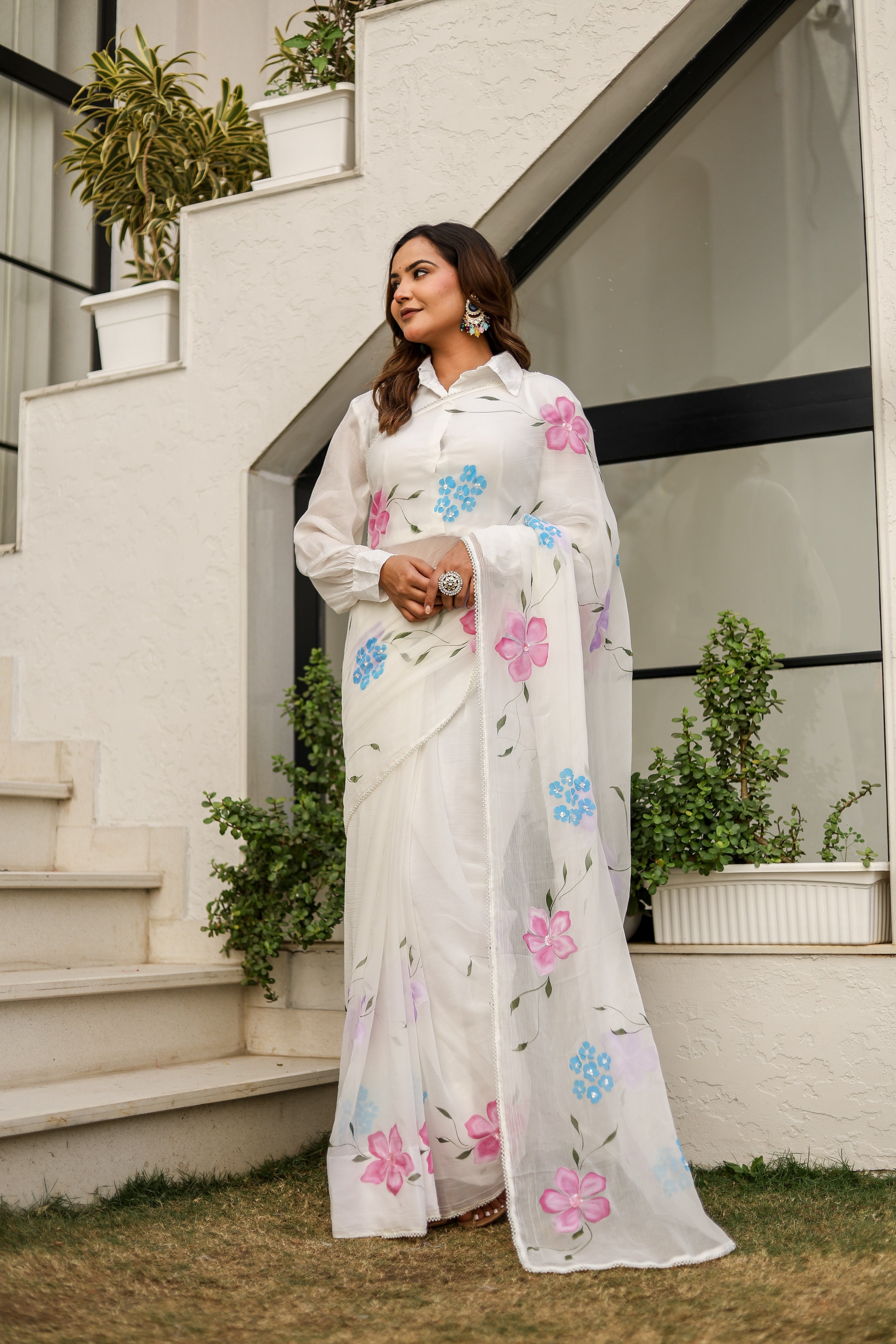 Moonlit Florals (Handpainted pure viscose chiffon saree with sequins work and pearl border)