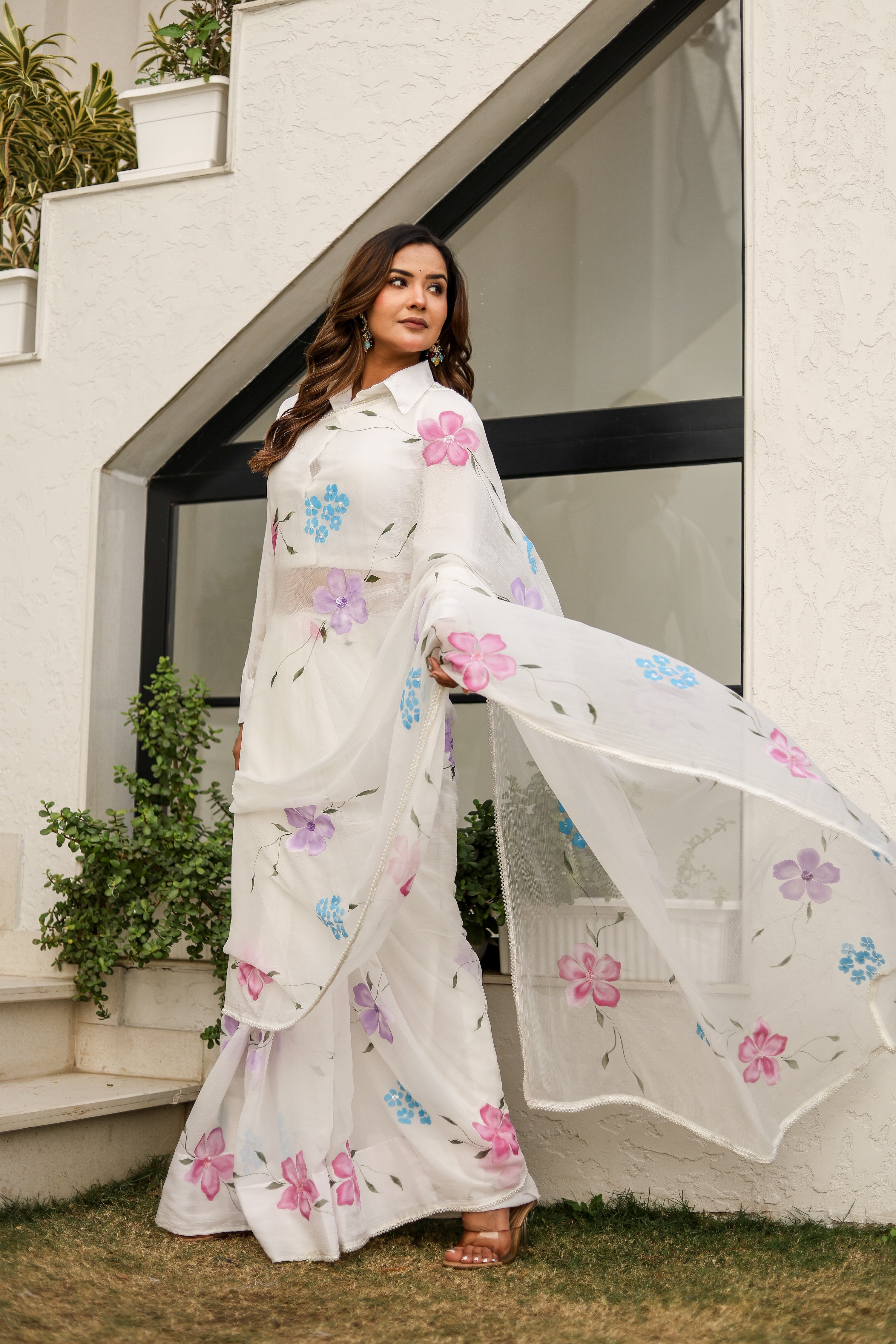 Moonlit Florals (Handpainted pure viscose chiffon saree with sequins work and pearl border)