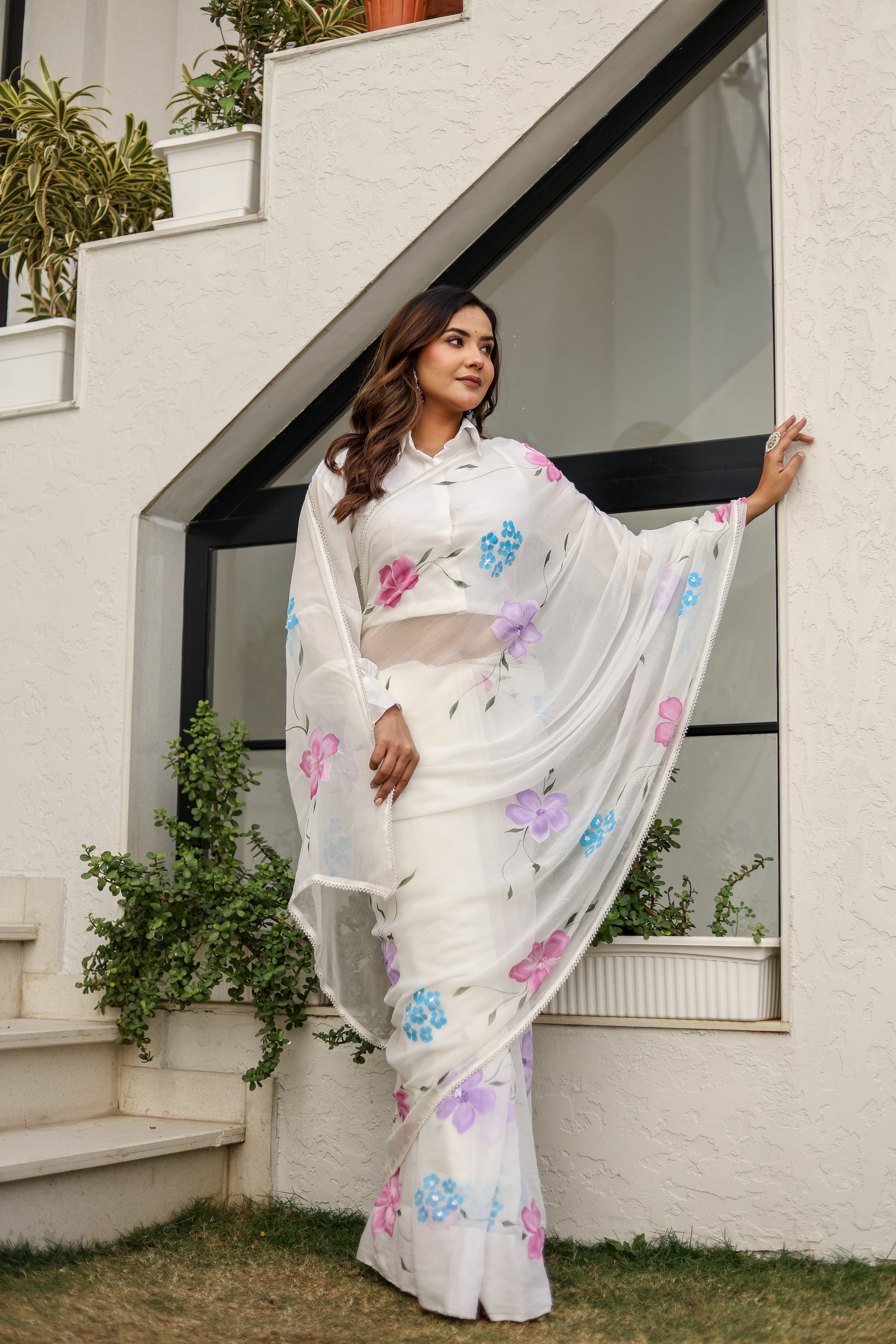 Moonlit Florals (Handpainted pure viscose chiffon saree with sequins work and pearl border)