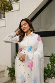 Moonlit Florals (Handpainted pure viscose chiffon saree with sequins work and pearl border)