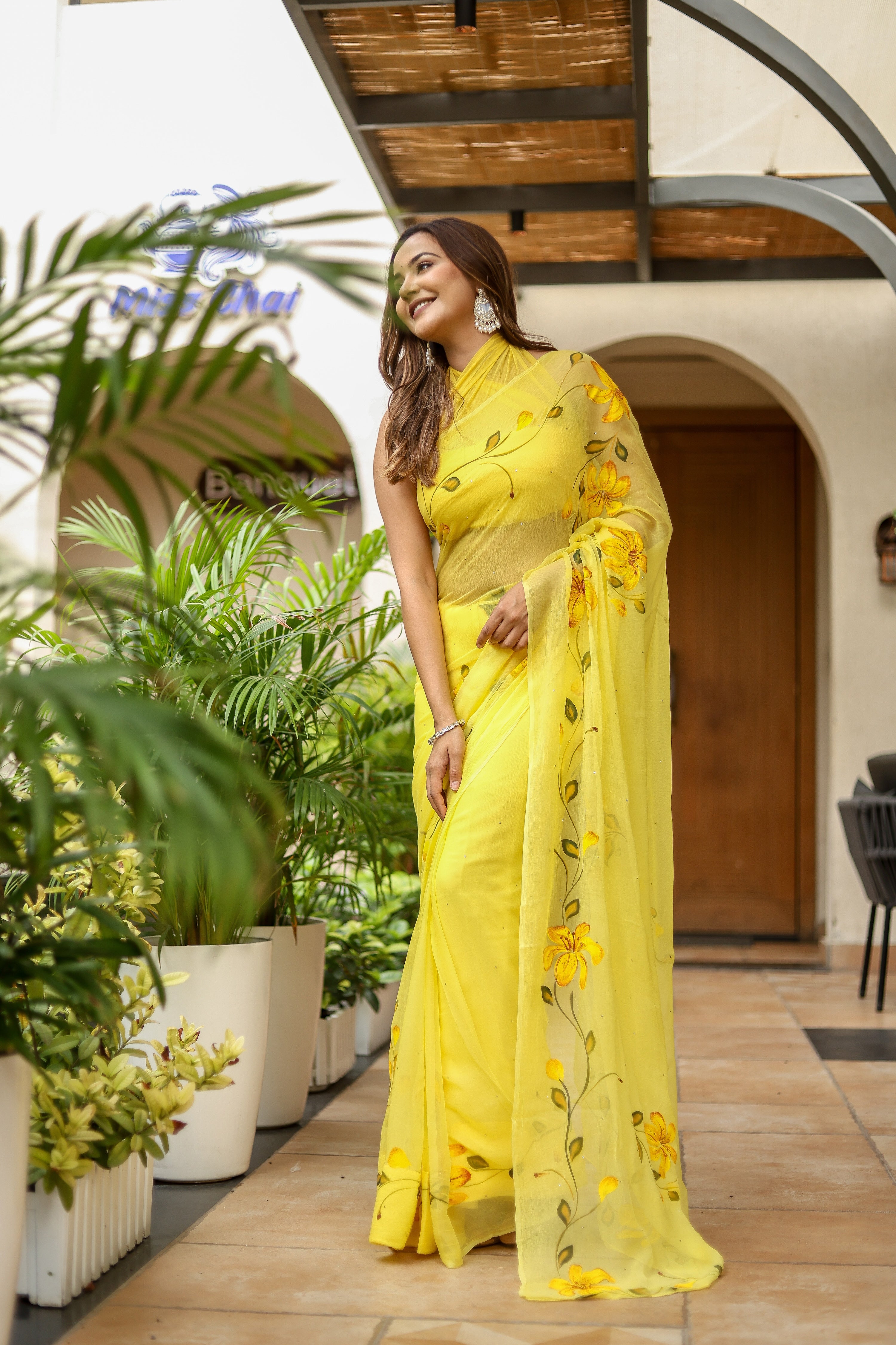 Floral Trail (Handpainted Yellow Pure Viscose Chiffon Saree with Mukaish Work)
