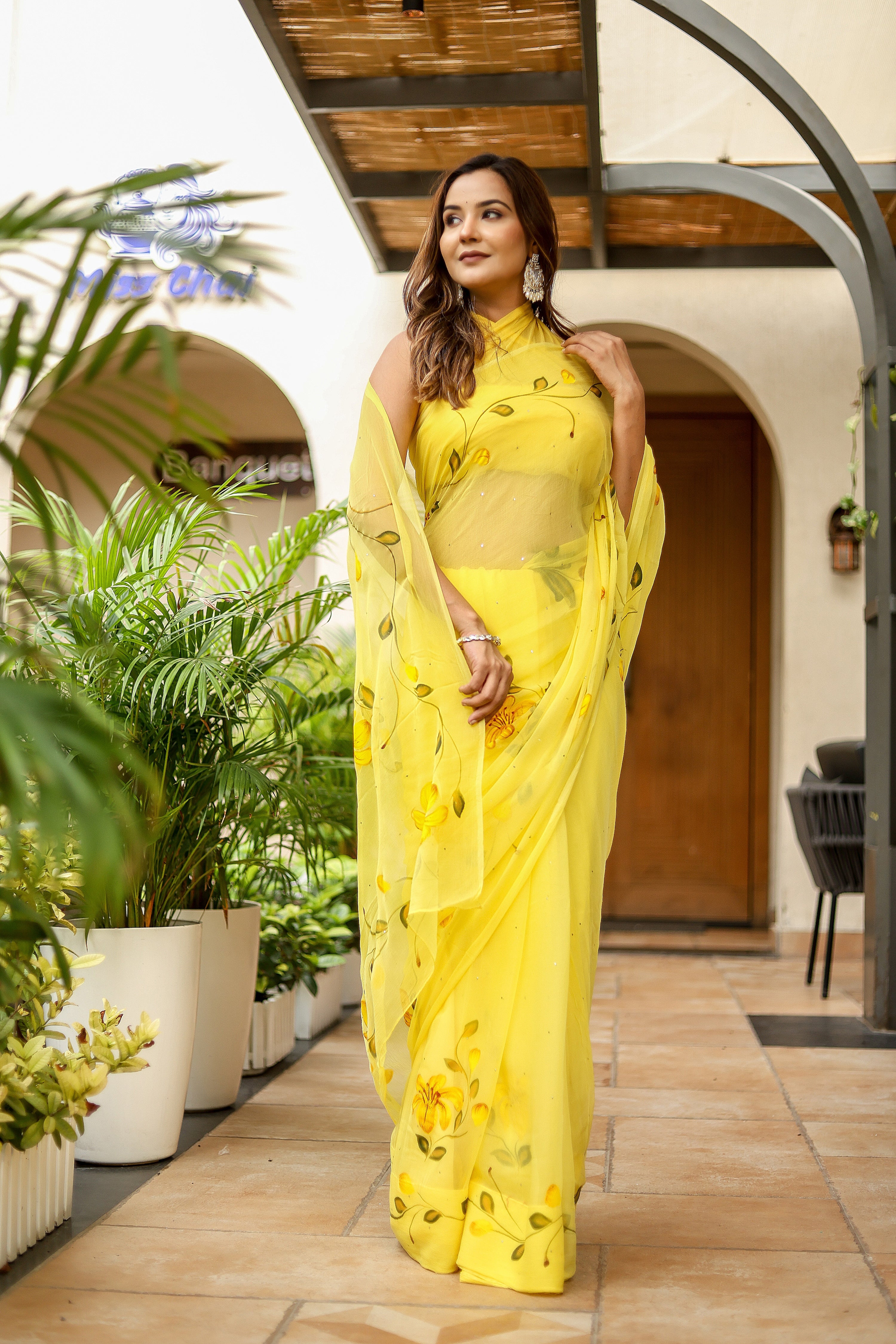 Floral Trail (Handpainted Yellow Pure Viscose Chiffon Saree with Mukaish Work)