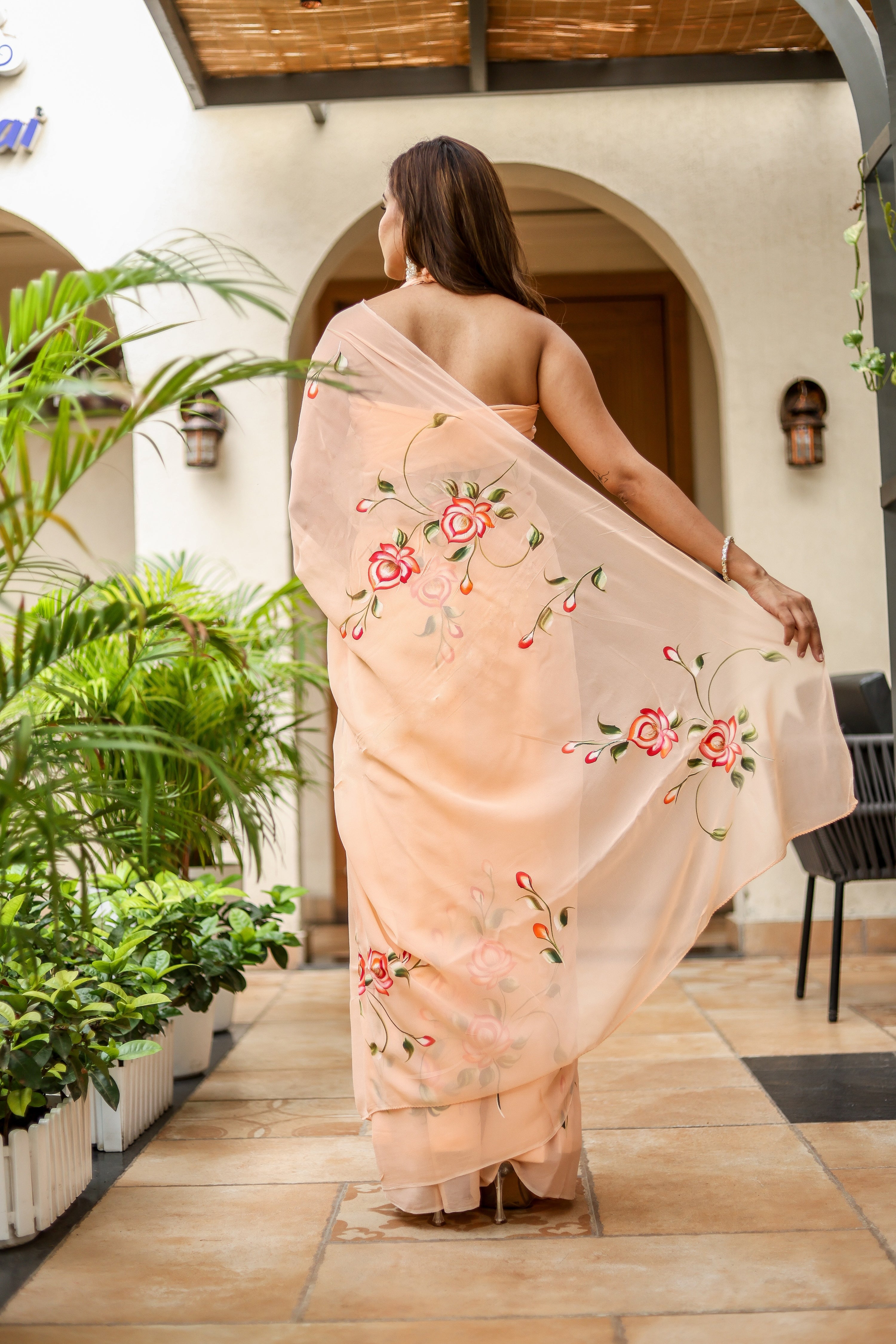 Peach Serenade (Handpainted Peach Georgette Saree)