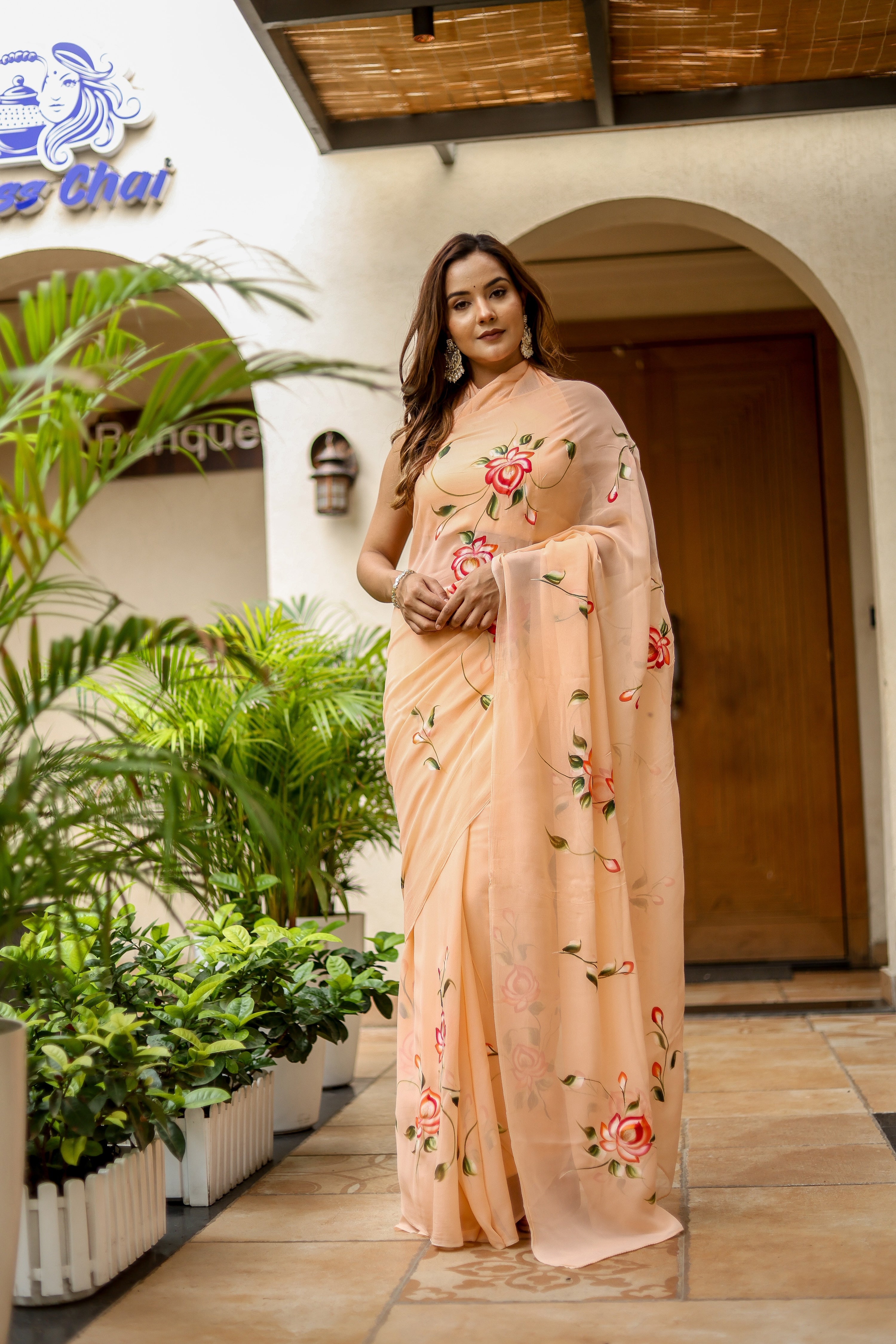 Peach Serenade (Handpainted Peach Georgette Saree)