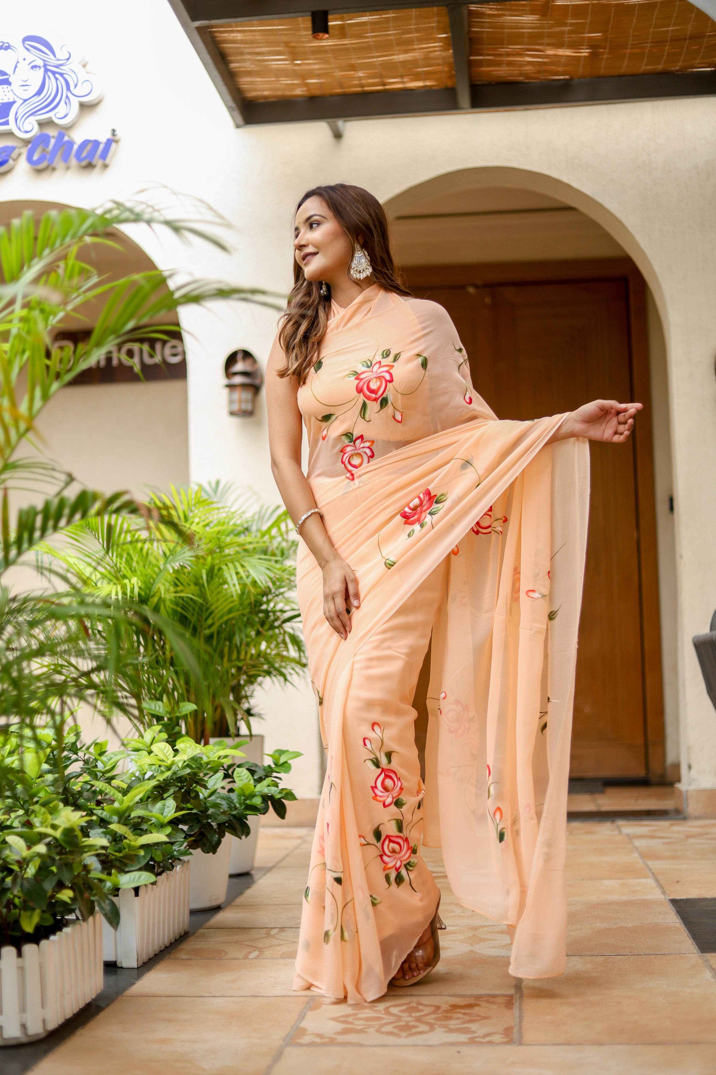 Peach Serenade (Handpainted Peach Georgette Saree)