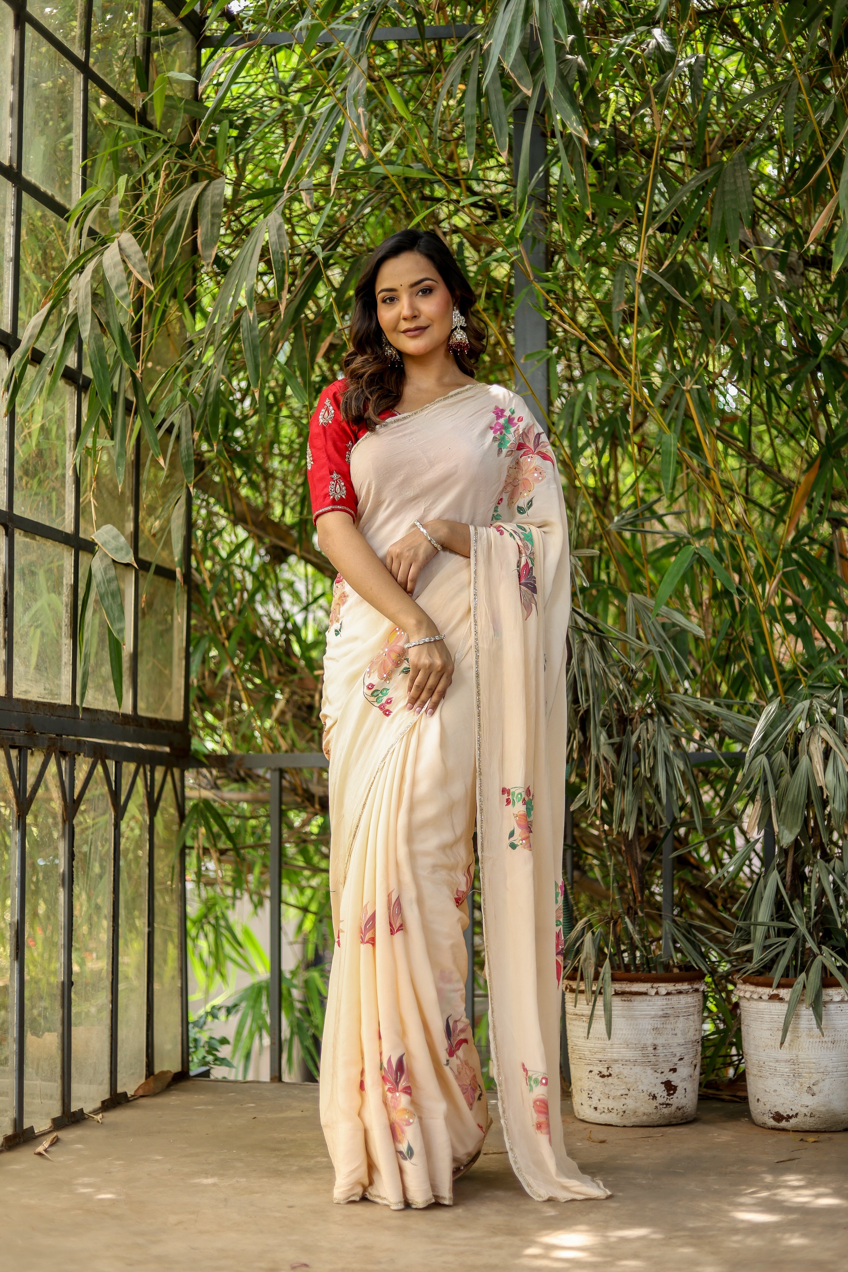Crimson Bloom (Handpainted and Embroidered Crepe Saree)