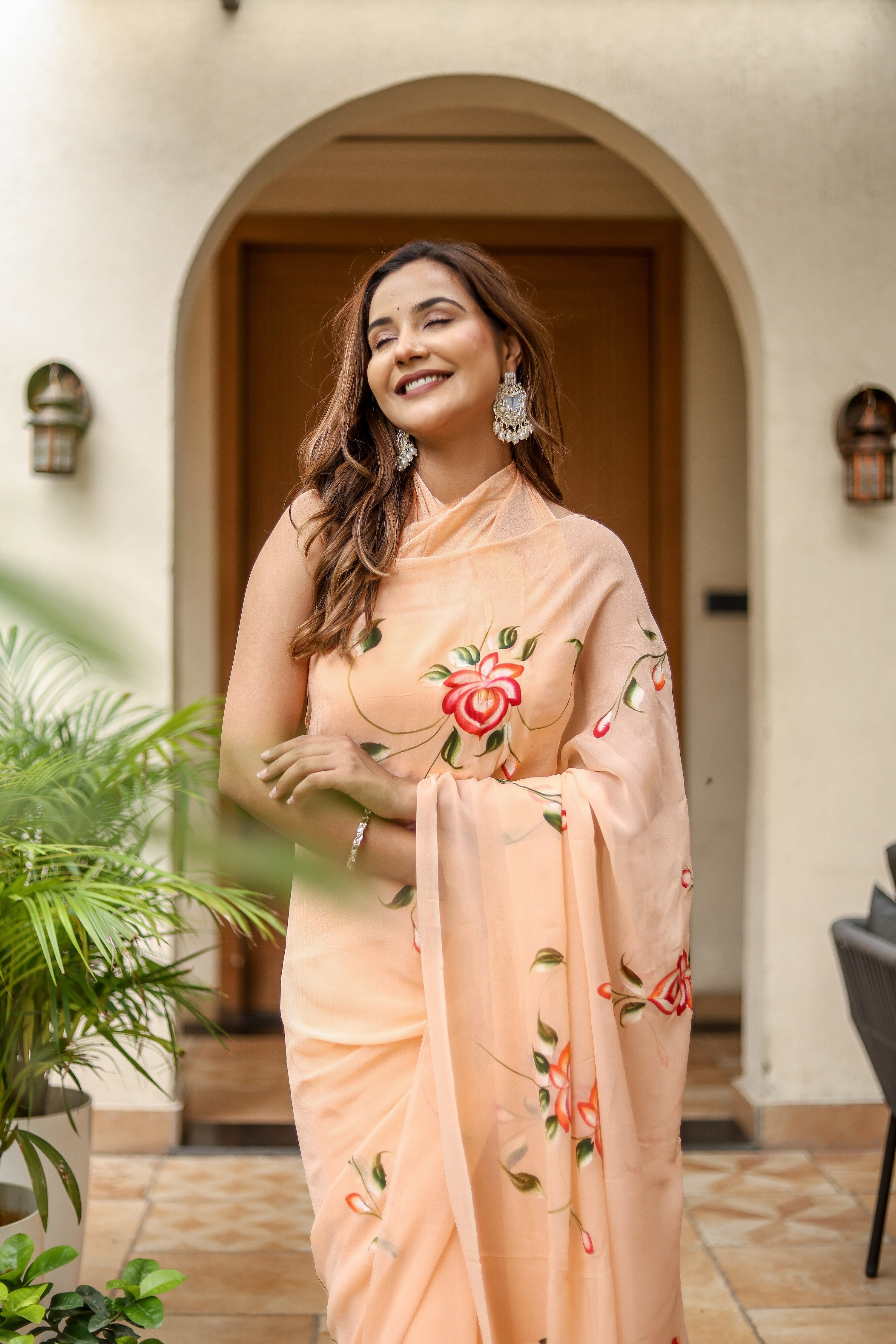 Peach Serenade (Handpainted Peach Georgette Saree)