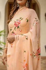 Peach Serenade (Handpainted Peach Georgette Saree)