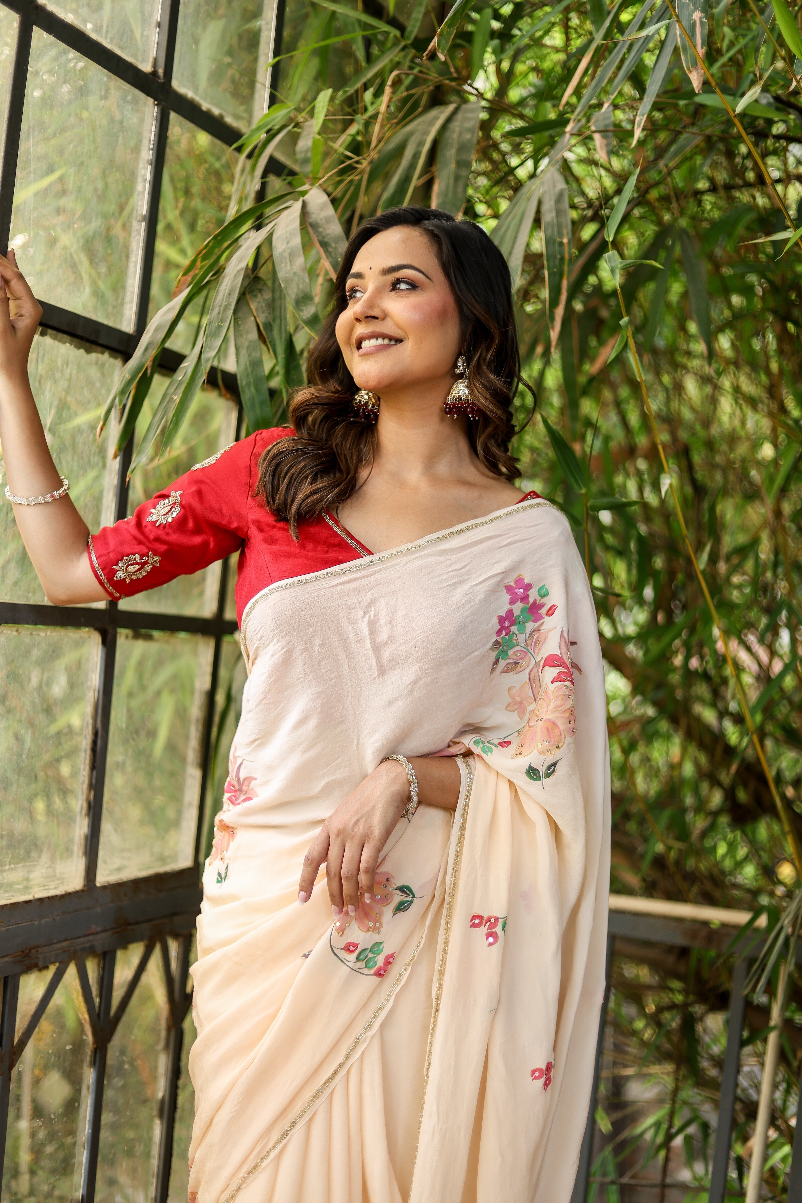 Crimson Bloom (Handpainted and Embroidered Crepe Saree)