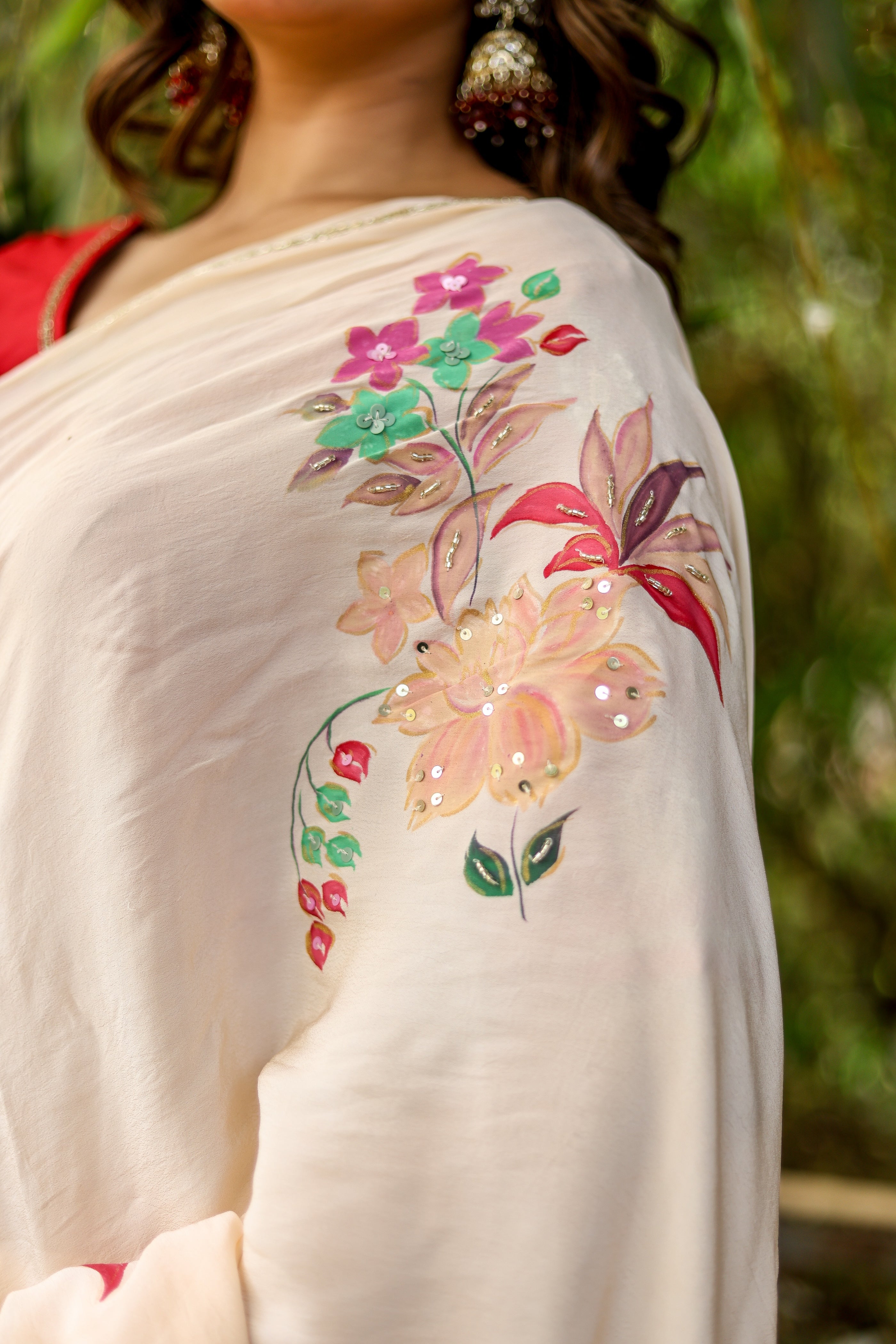 Crimson Bloom (Handpainted and Embroidered Crepe Saree)