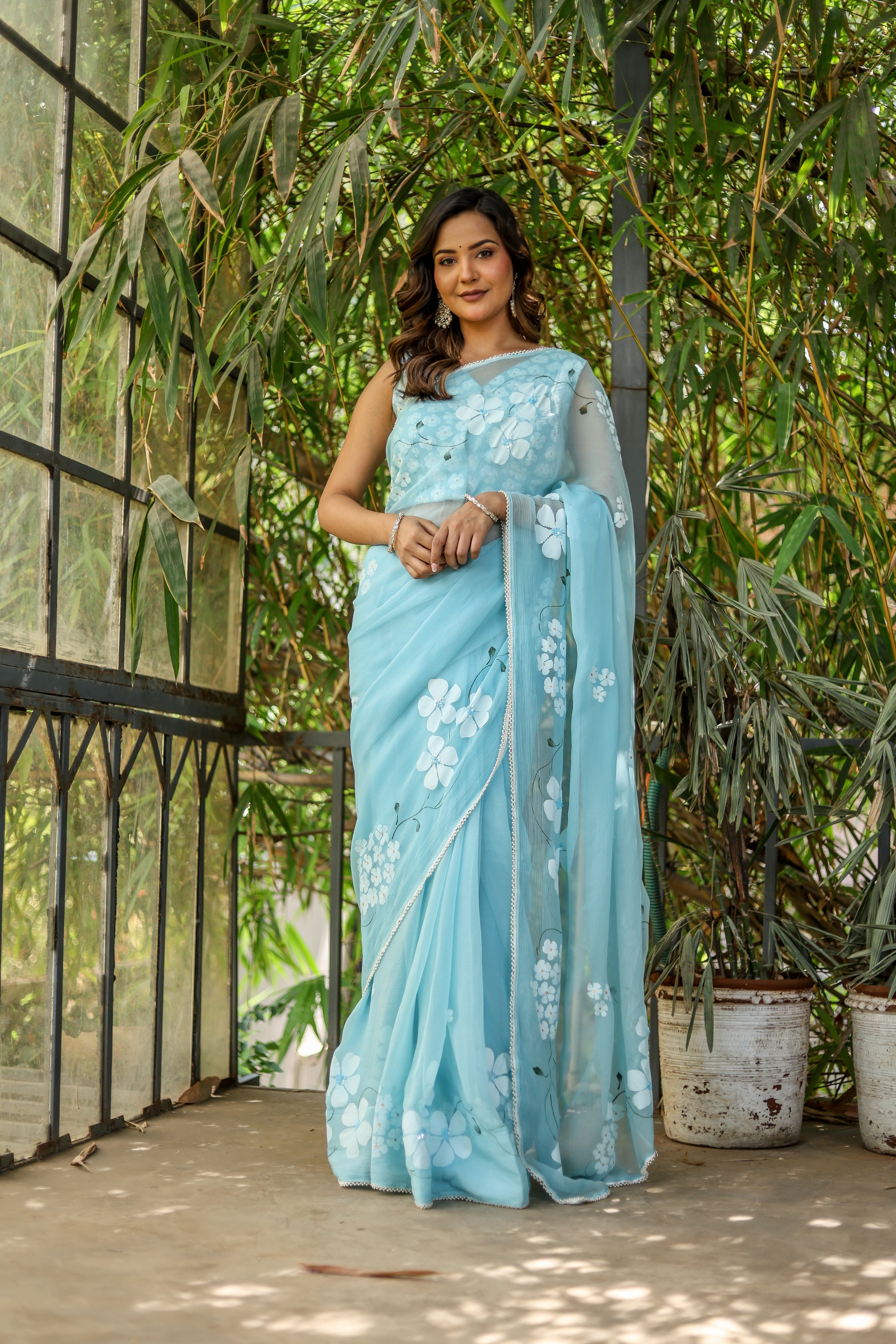 Blue Petal Muse (Handpainted Blue Chiffon Saree with Sequins Work)