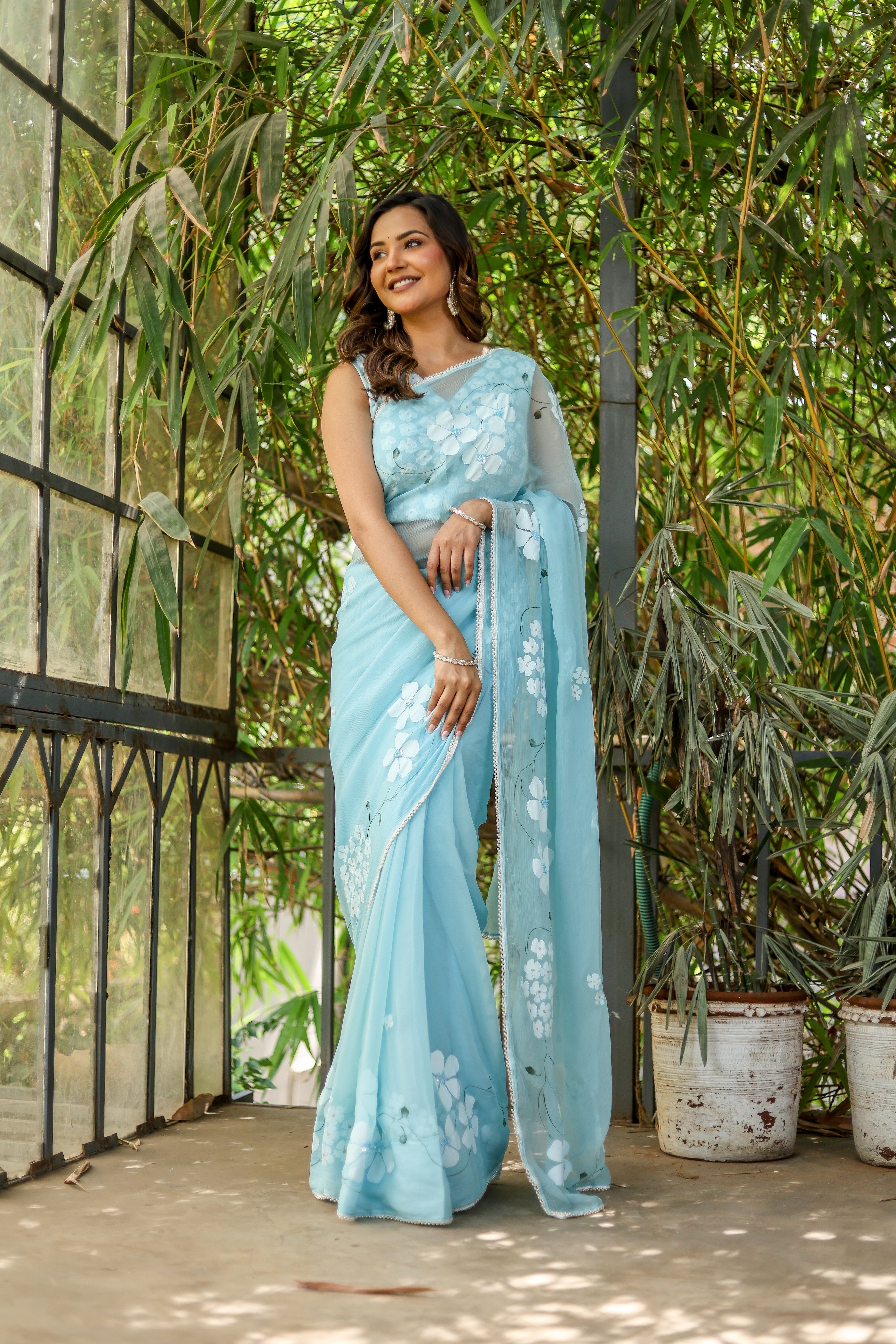 Blue Petal Muse (Handpainted Blue Chiffon Saree with Sequins Work)