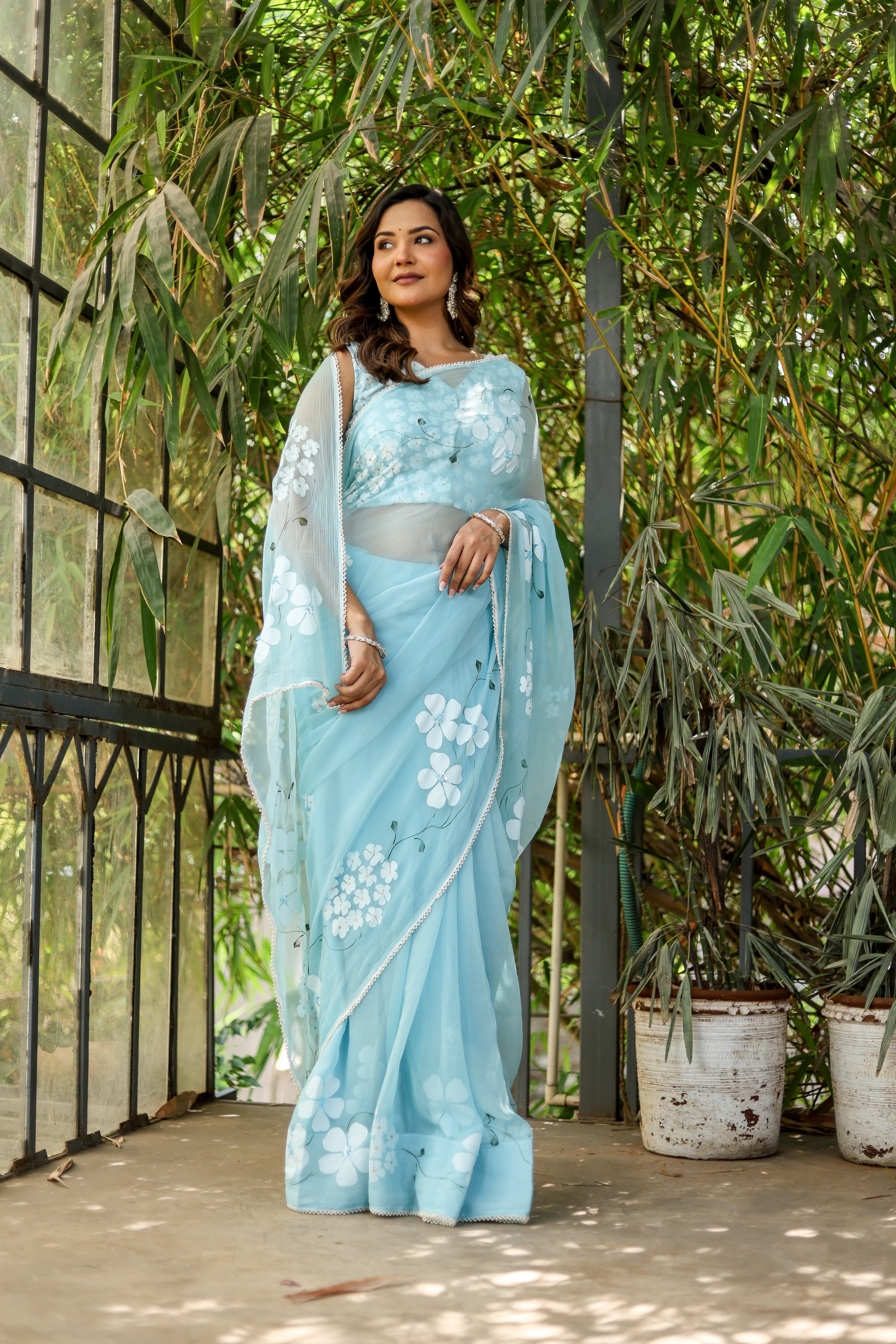 Blue Petal Muse (Handpainted Blue Chiffon Saree with Sequins Work)