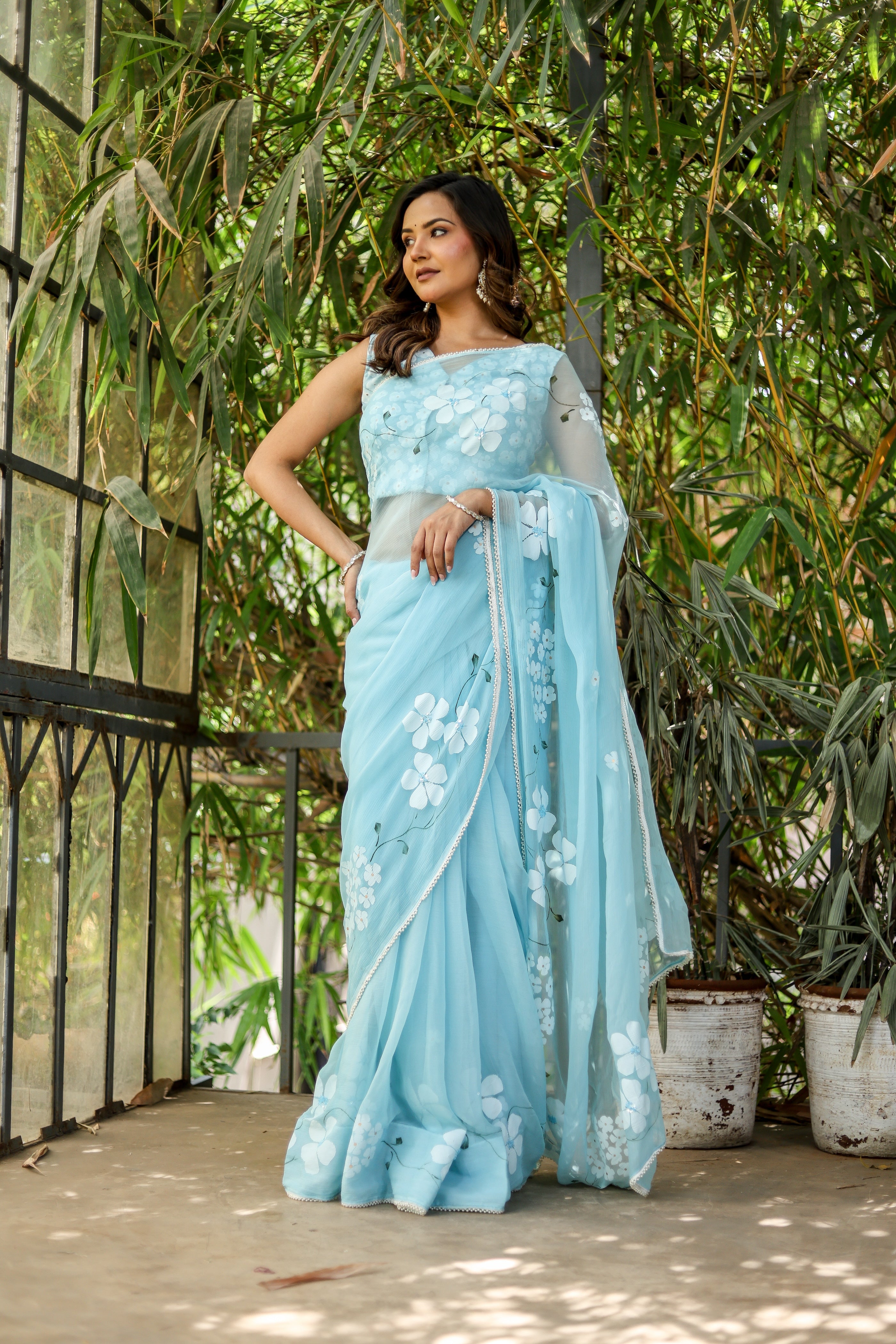 Blue Petal Muse (Handpainted Blue Chiffon Saree with Sequins Work)