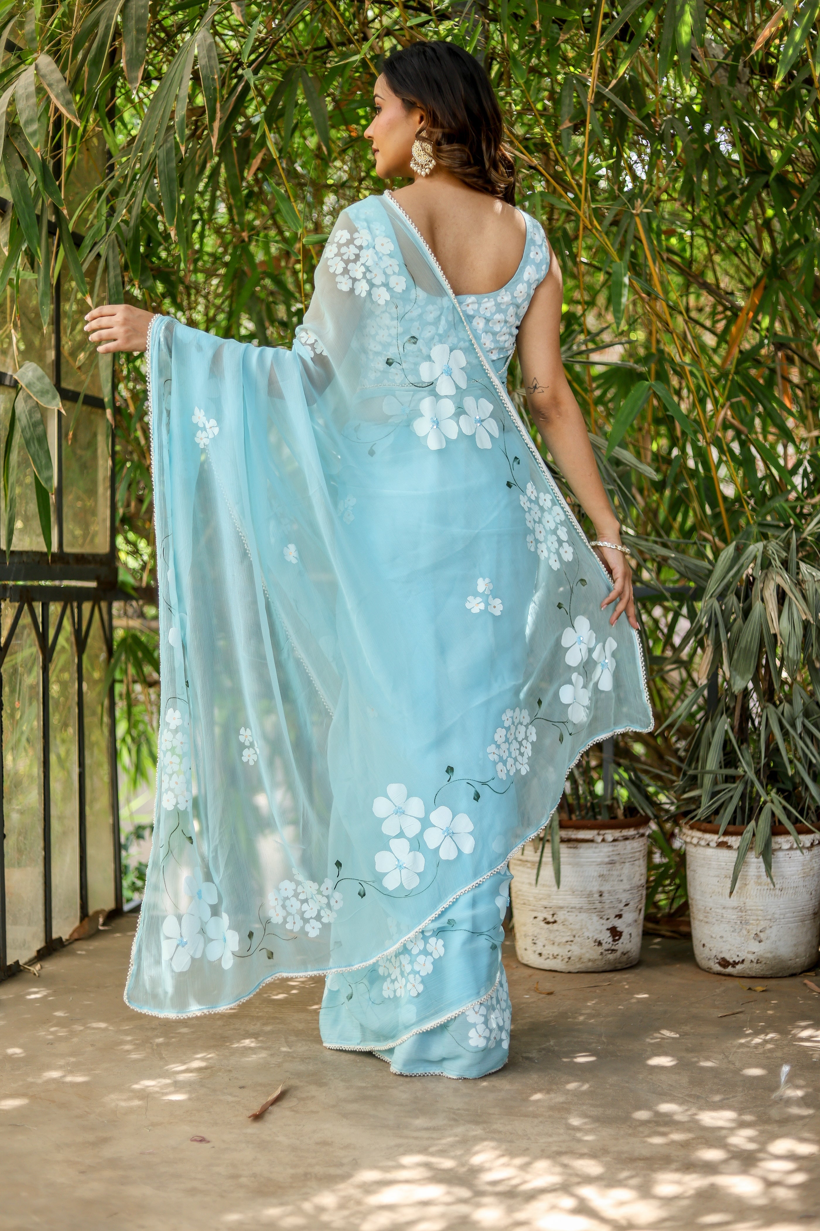 Blue Petal Muse (Handpainted Blue Chiffon Saree with Sequins Work)