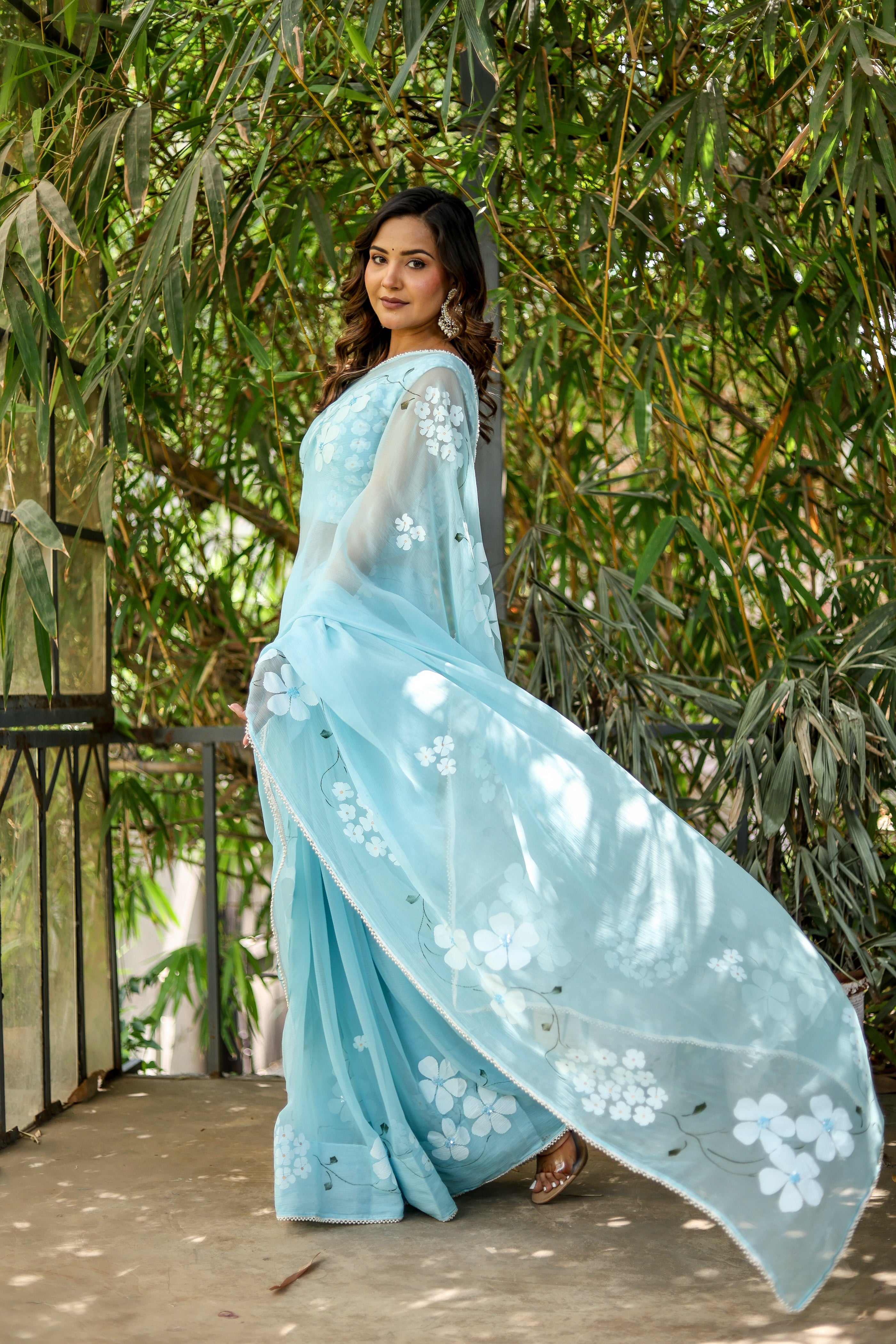Blue Petal Muse (Handpainted Blue Chiffon Saree with Sequins Work)