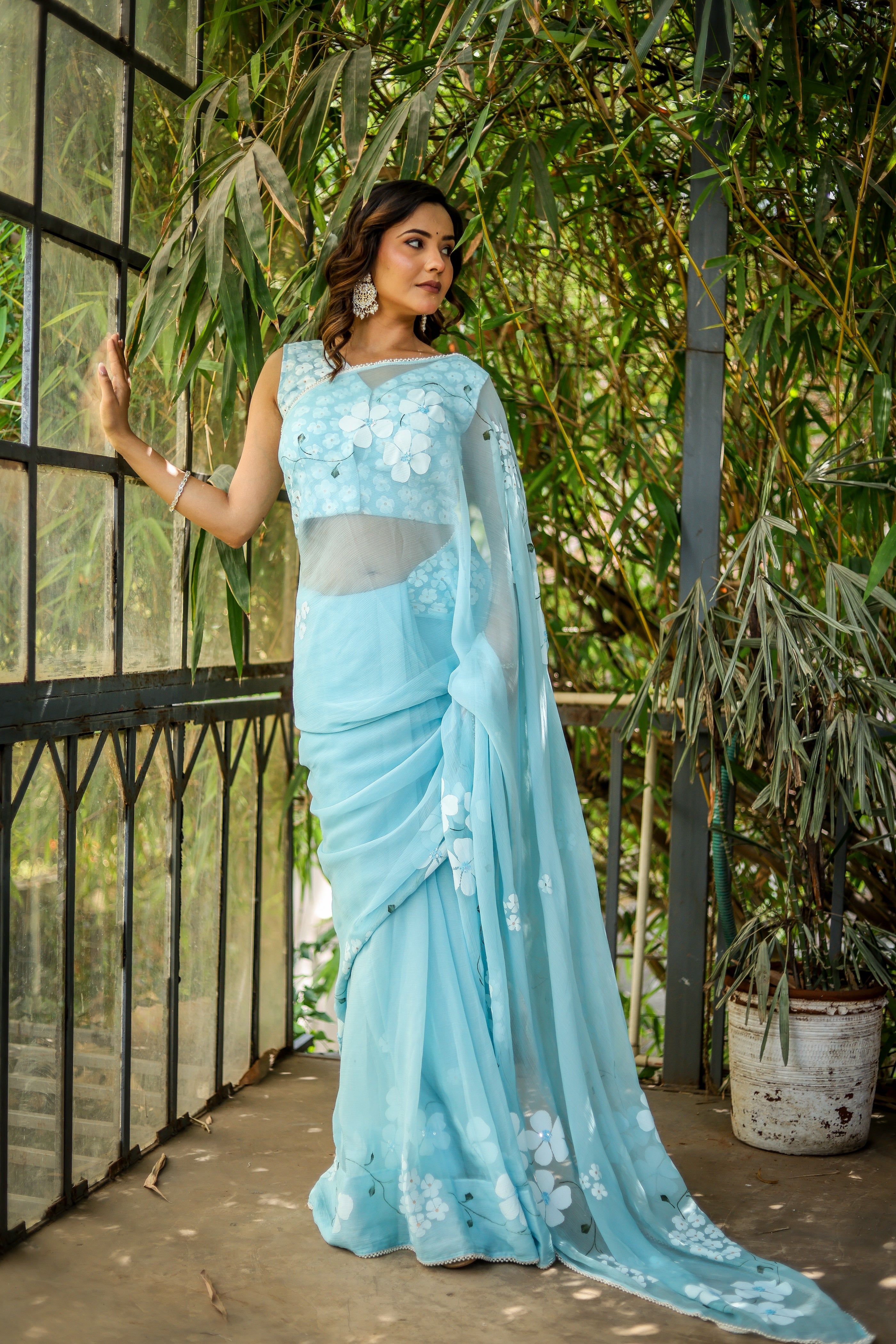 Blue Petal Muse (Handpainted Blue Chiffon Saree with Sequins Work)