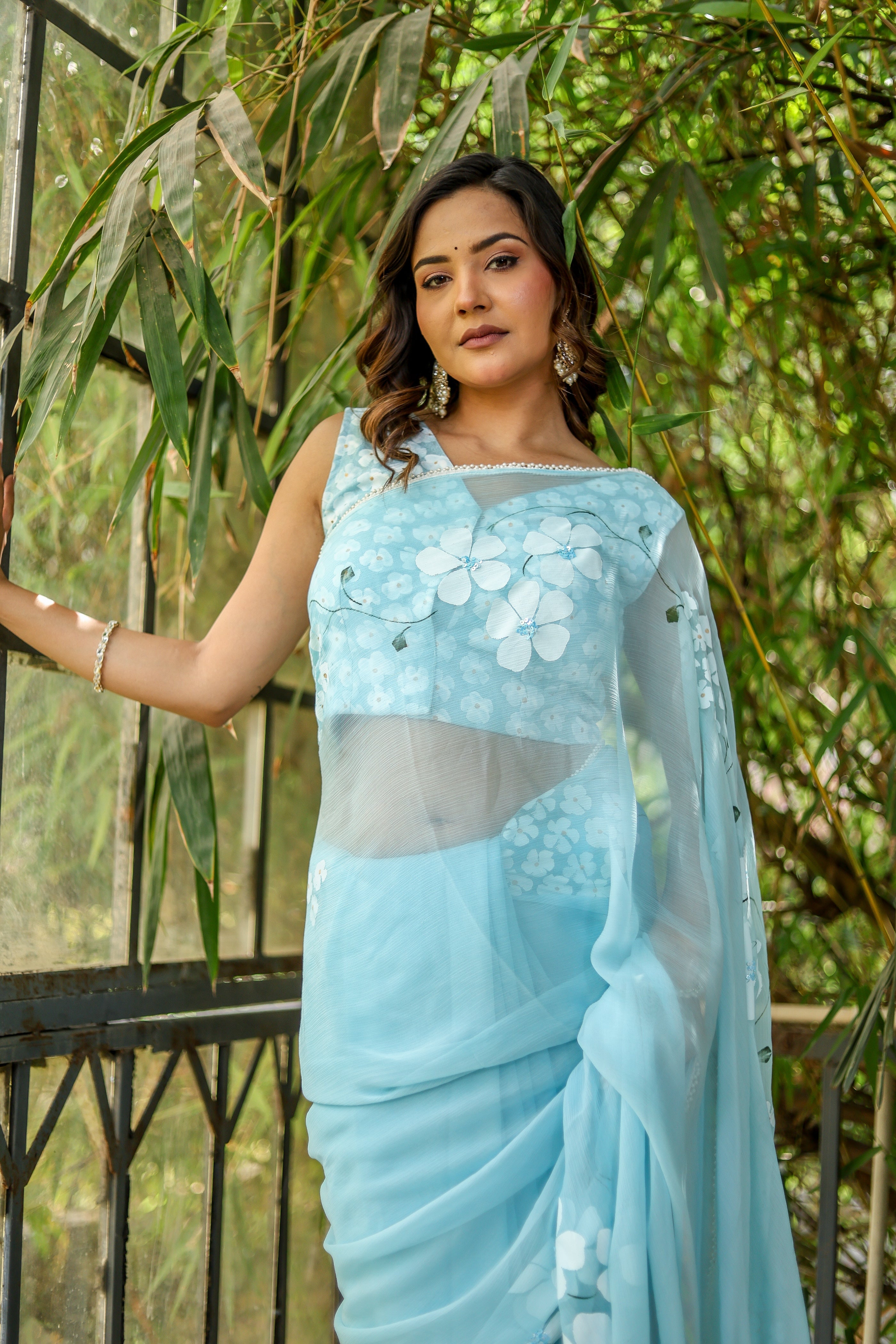 Blue Petal Muse (Handpainted Blue Chiffon Saree with Sequins Work)