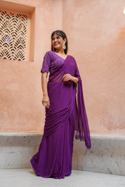 Purple Chiffon Saree with Schifli Blouse piece.