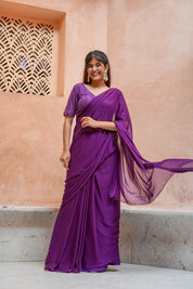 Purple Chiffon Saree with Schifli Blouse piece.