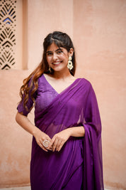 Purple Chiffon Saree with Schifli Blouse piece.