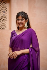 Purple Chiffon Saree with Schifli Blouse piece.