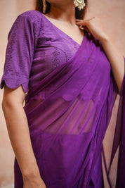 Purple Chiffon Saree with Schifli Blouse piece.