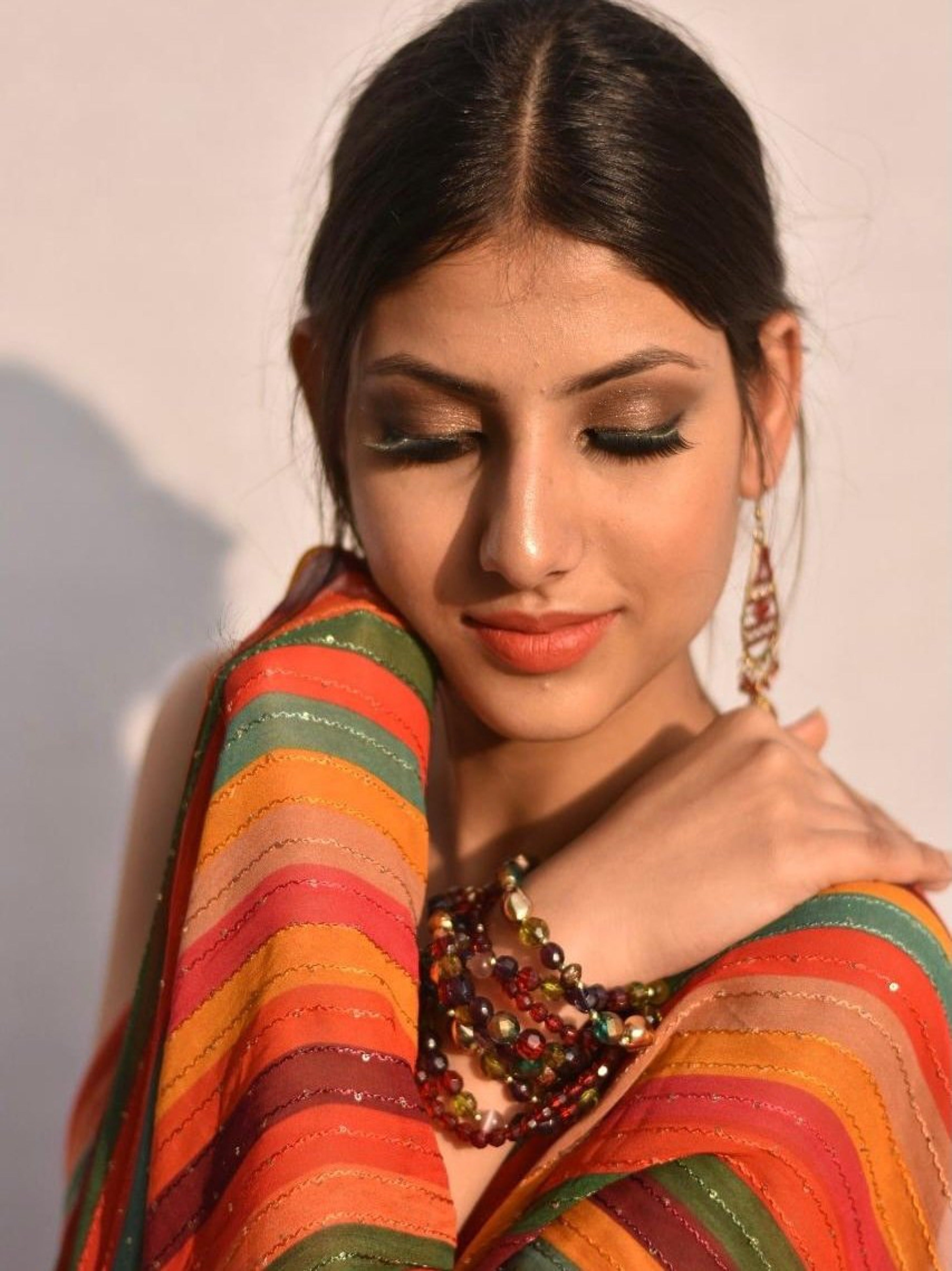 Bohemian Soul (Georgette Mutlicolour thread and sequins Saree)